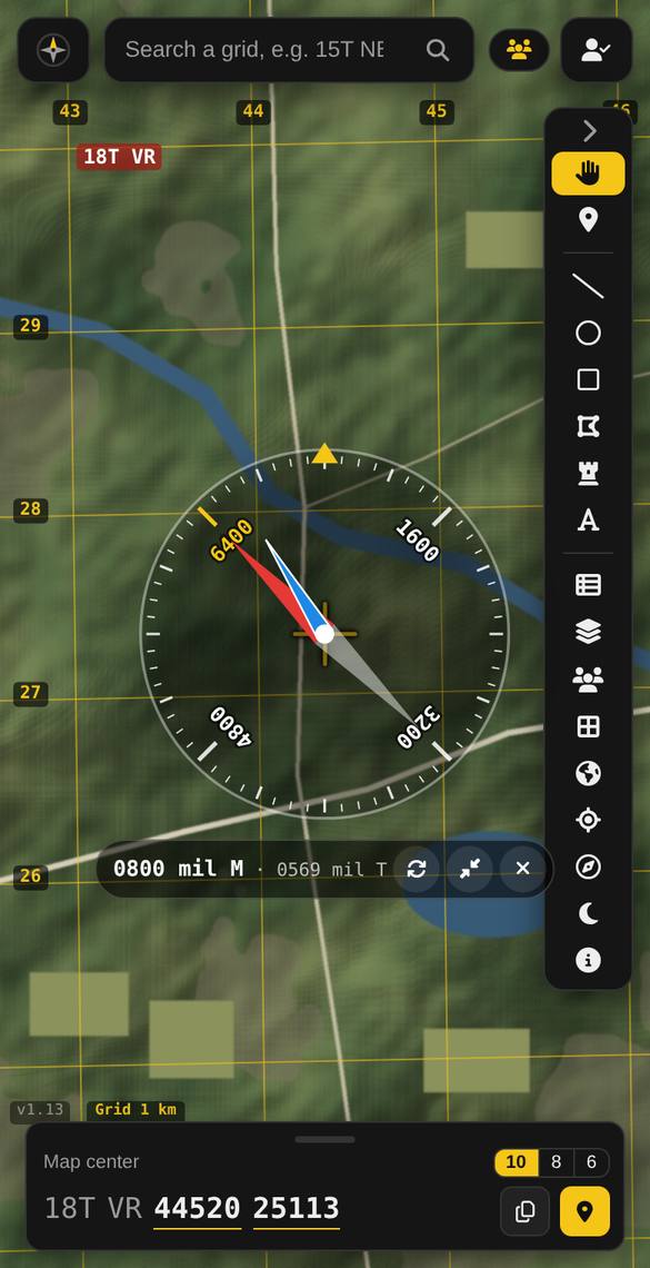 Mil compass with true and magnetic north